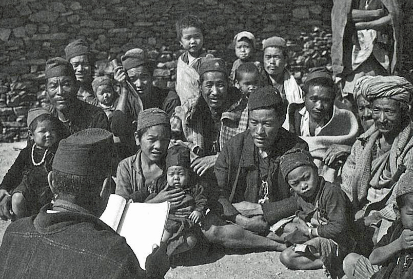 Hasta Ram reads Scripture to Kham believers on his rooftop.